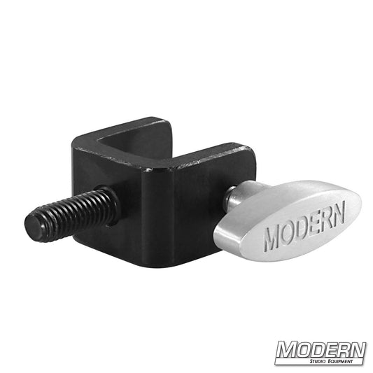 C-Clamp adapter bracket – heavy-duty mounting bracket for attaching grip gear or lighting fixtures to standard C-clamps in film and studio production.