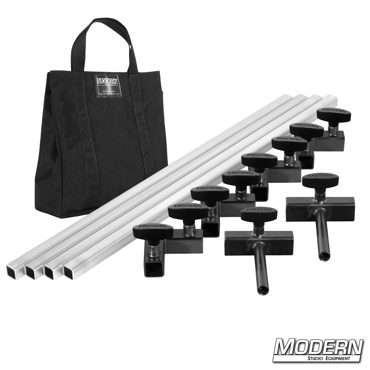 Film production frame kit showing aluminum tubes, ears, and connectors laid out with black bag